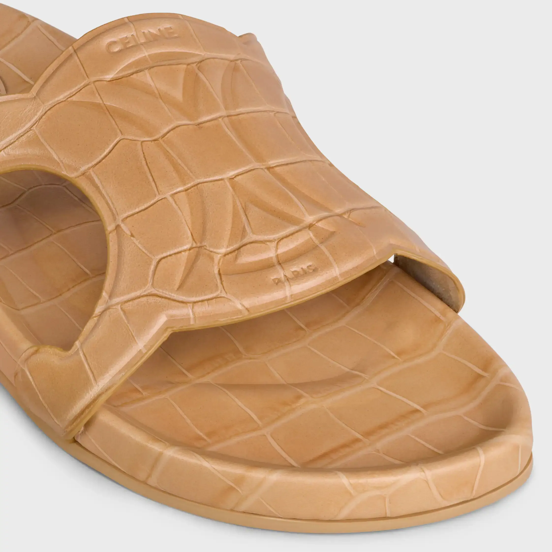 TRIOMPHE SLIDE EN CUERO DE TERNERA ESTAMPADO CON CROCODILO
