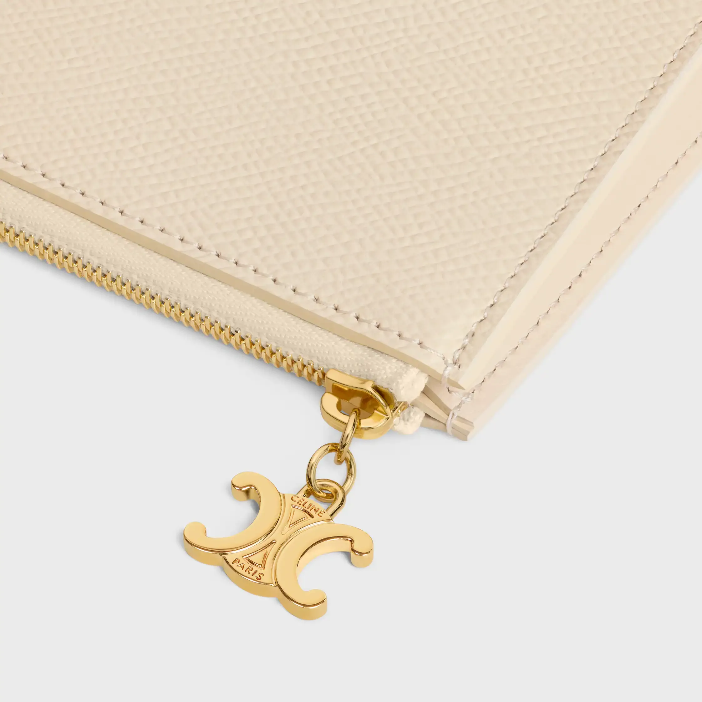 CONJUNTO DE TRES BOLSILLOS TRIOMPHE CHARMS EN TELA TRIOMPHE Y CUERO DE TERNERA GRANADO