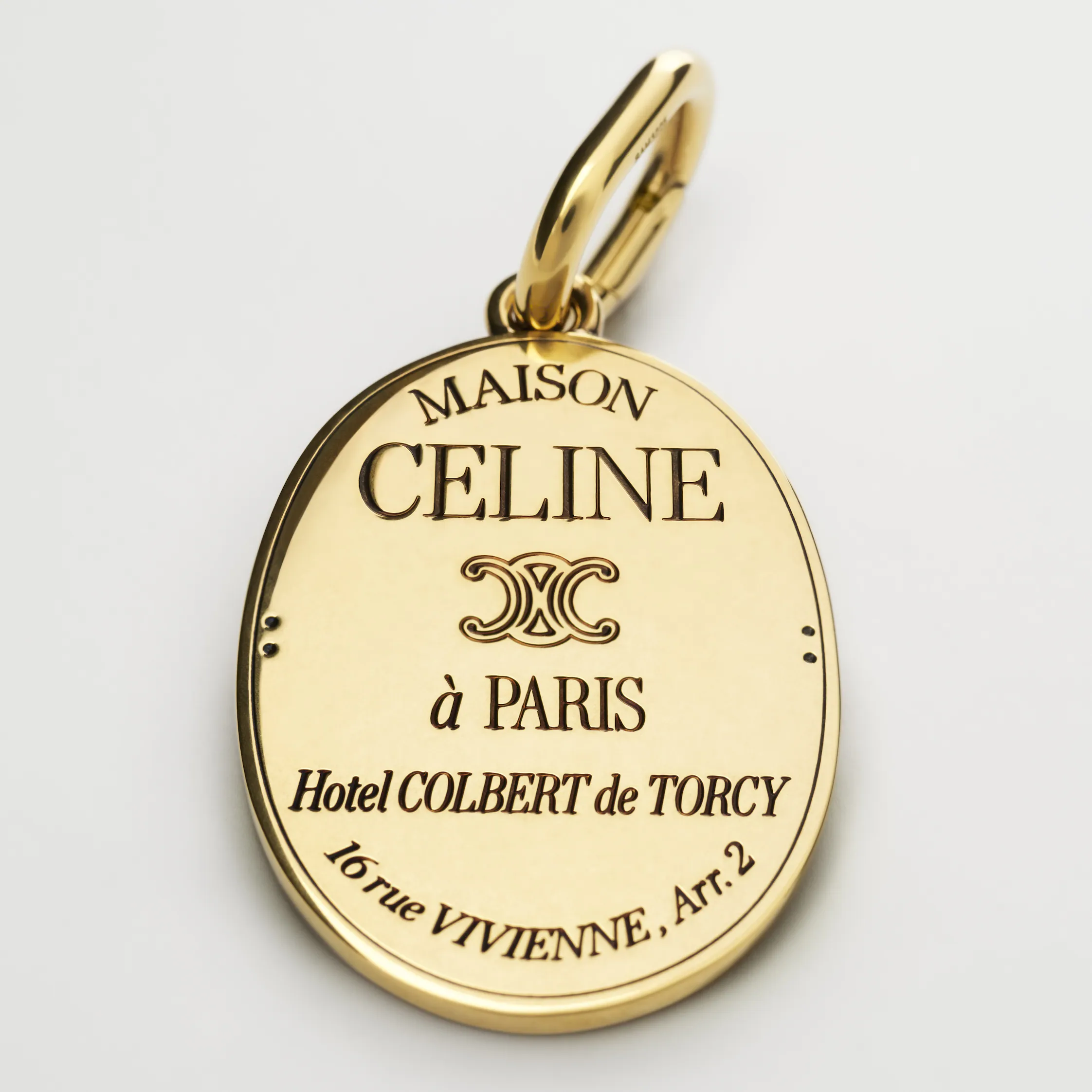CHARMS MAISON CELINE MEDALLA EN LATÓN CON ACABADO EN ORO