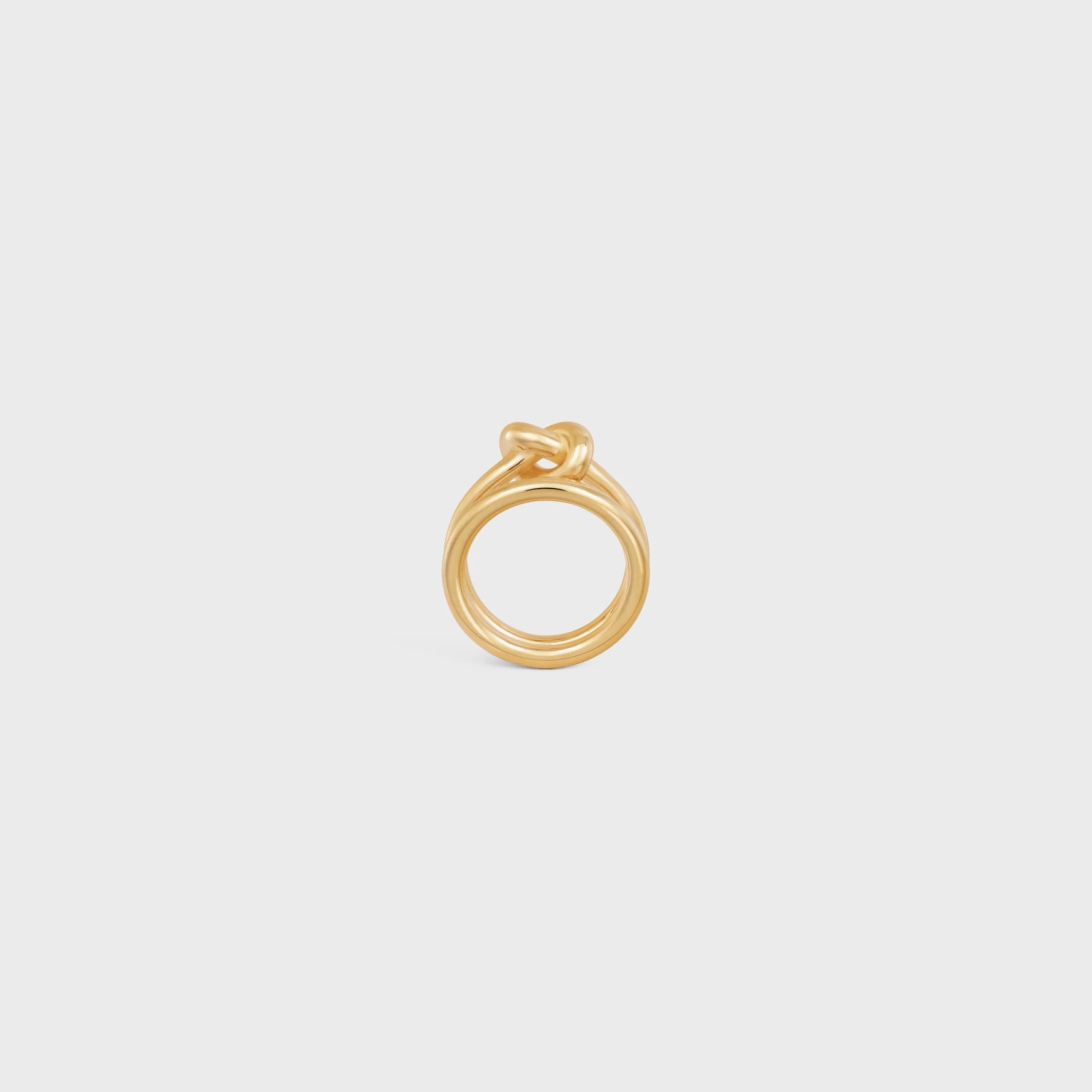 Anillo doble con nudo en latón con acabado dorado