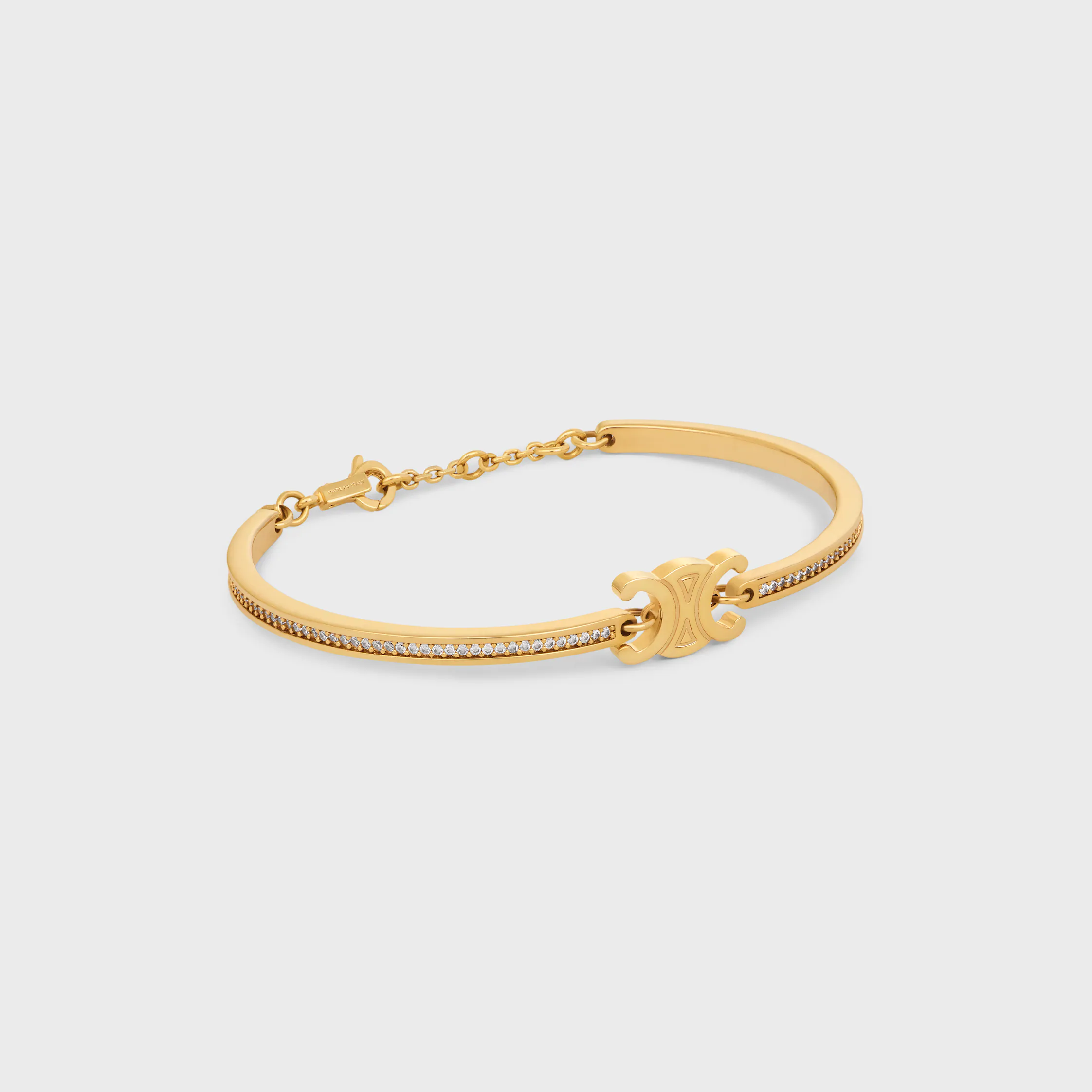 Pulsera articulada Triomphe con brillantes de strass y latón con acabado dorado