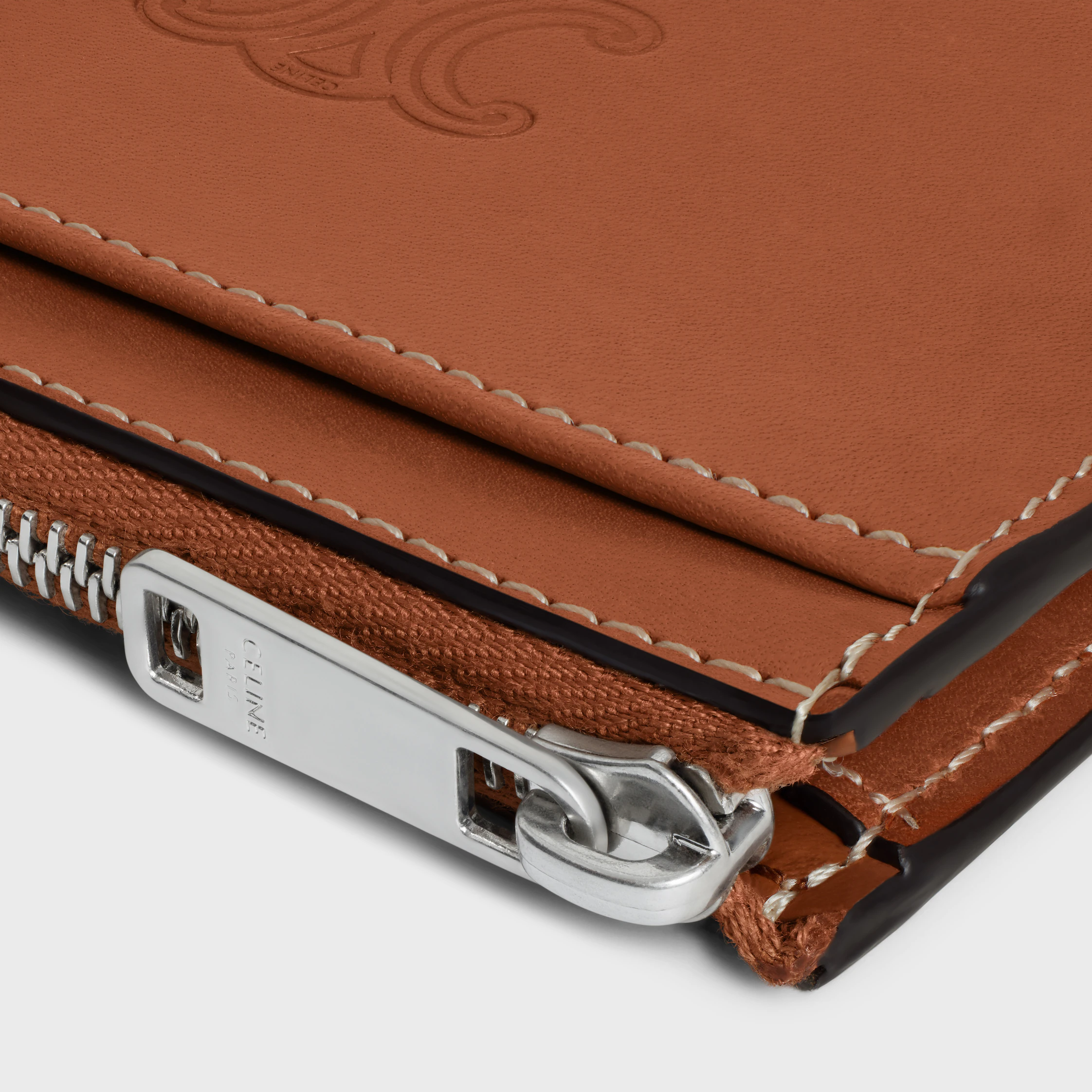 Porta tarjetas con cremallera en cuero de ternera natural con relieve triomphe