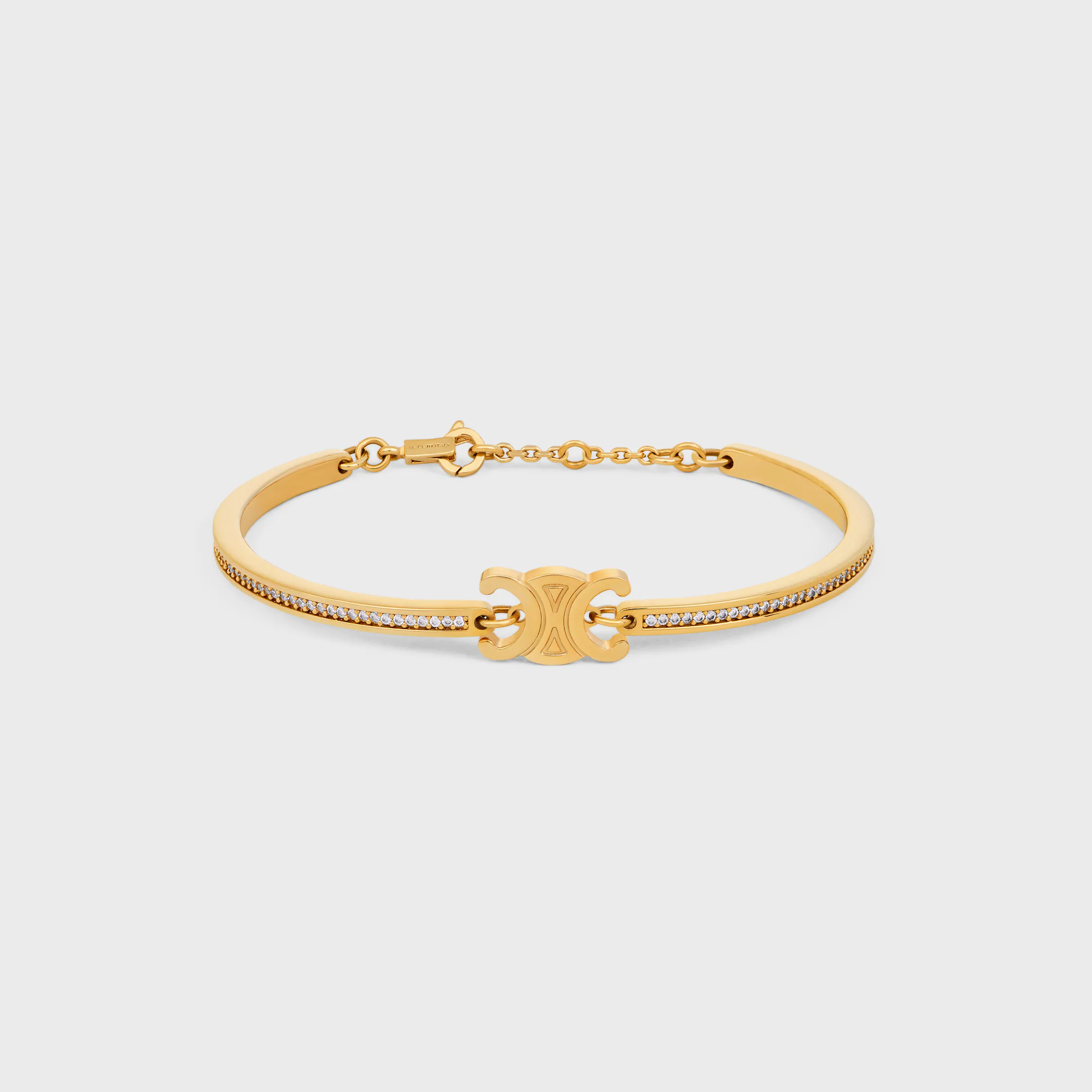 Pulsera articulada Triomphe con brillantes de strass y latón con acabado dorado