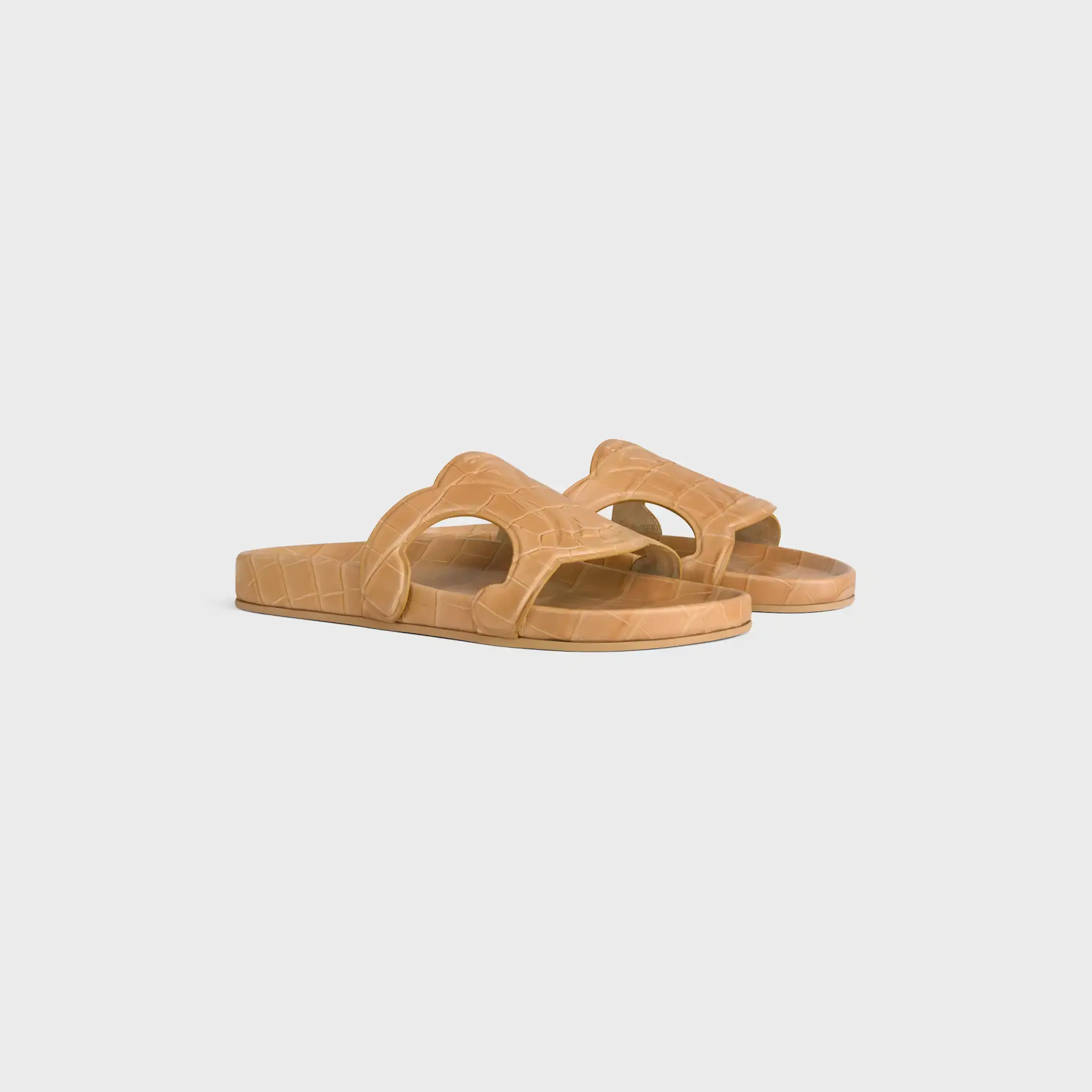 TRIOMPHE SLIDE EN CUERO DE TERNERA ESTAMPADO CON CROCODILO