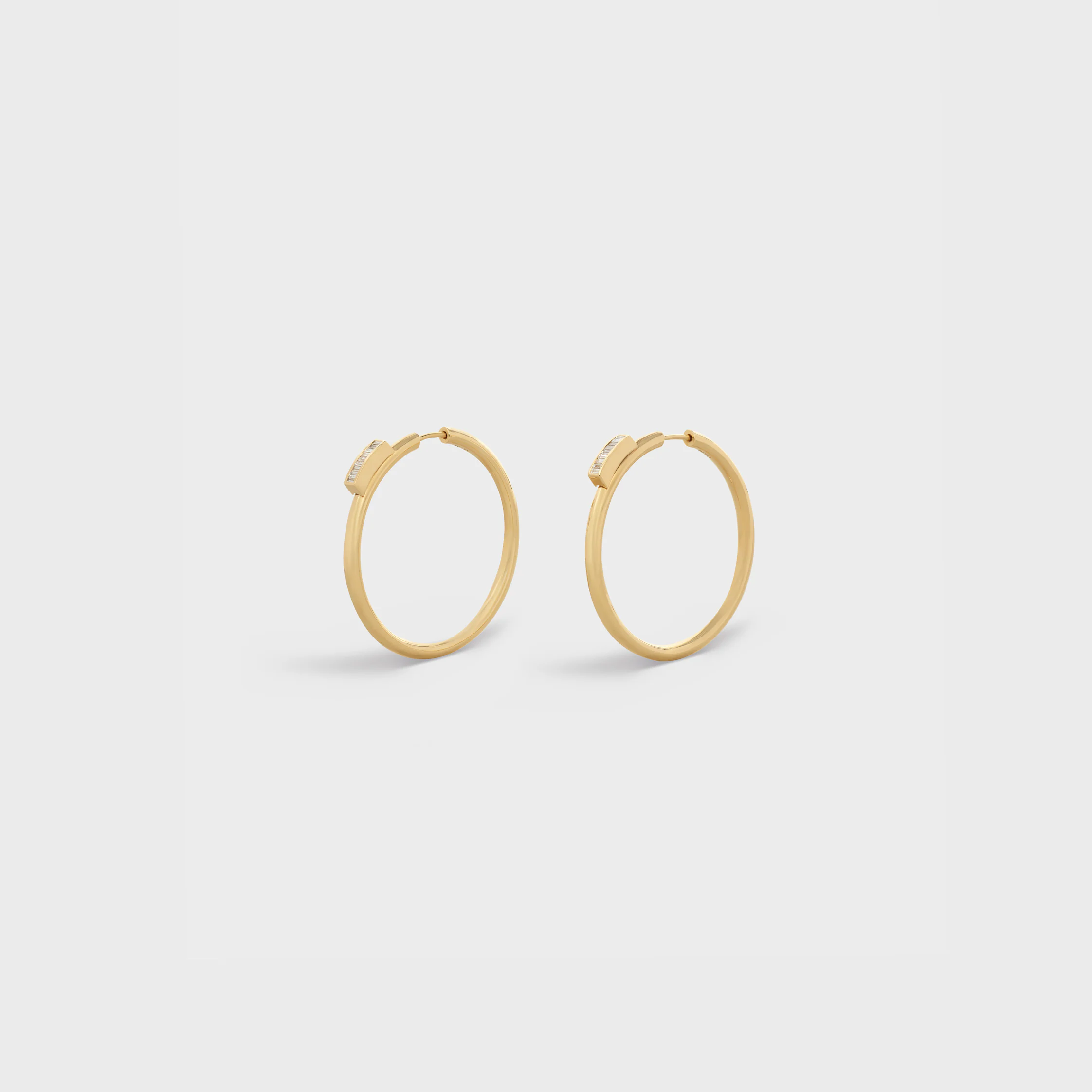 Aros grandes en oro amarillo y diamantes