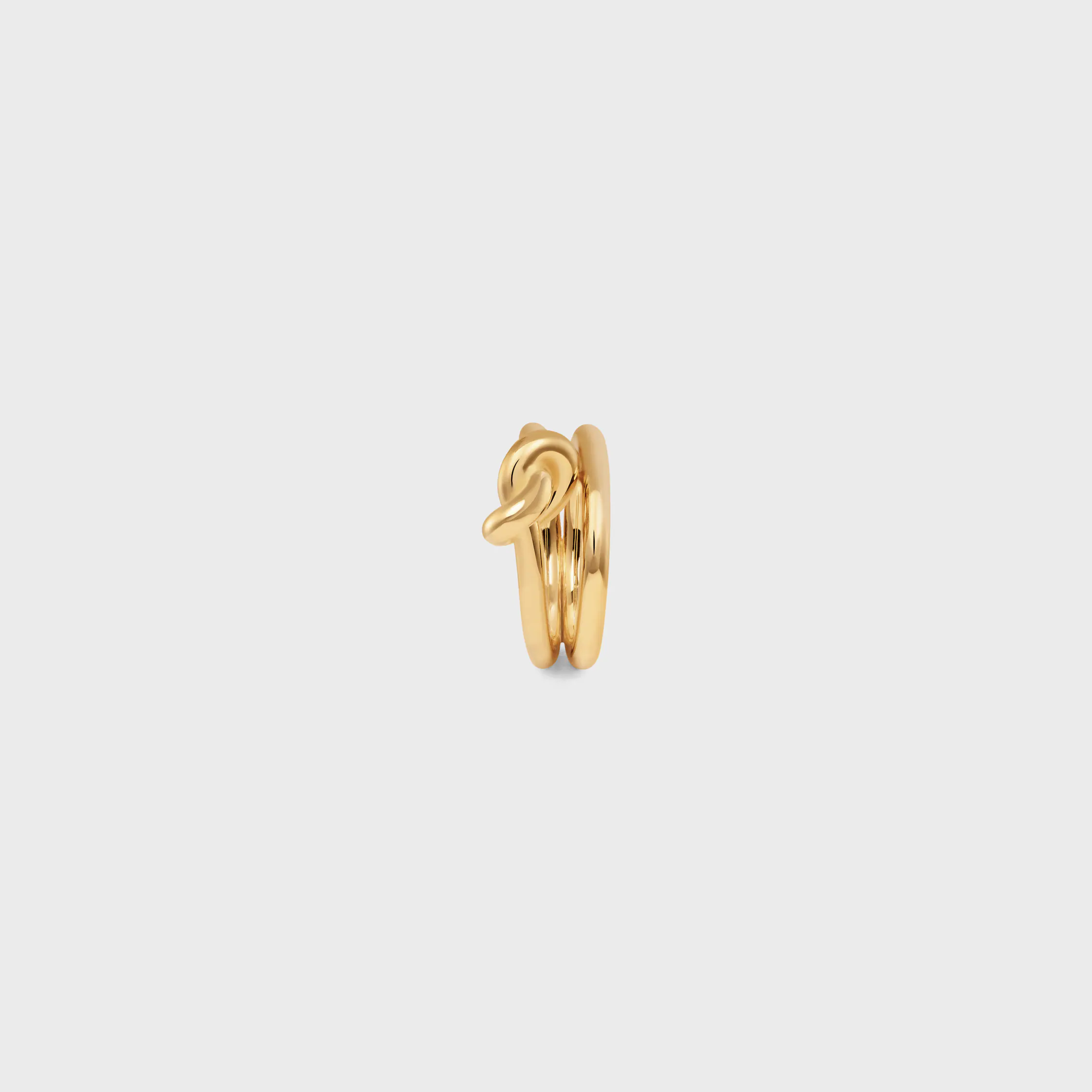 Anillo doble con nudo en latón con acabado dorado