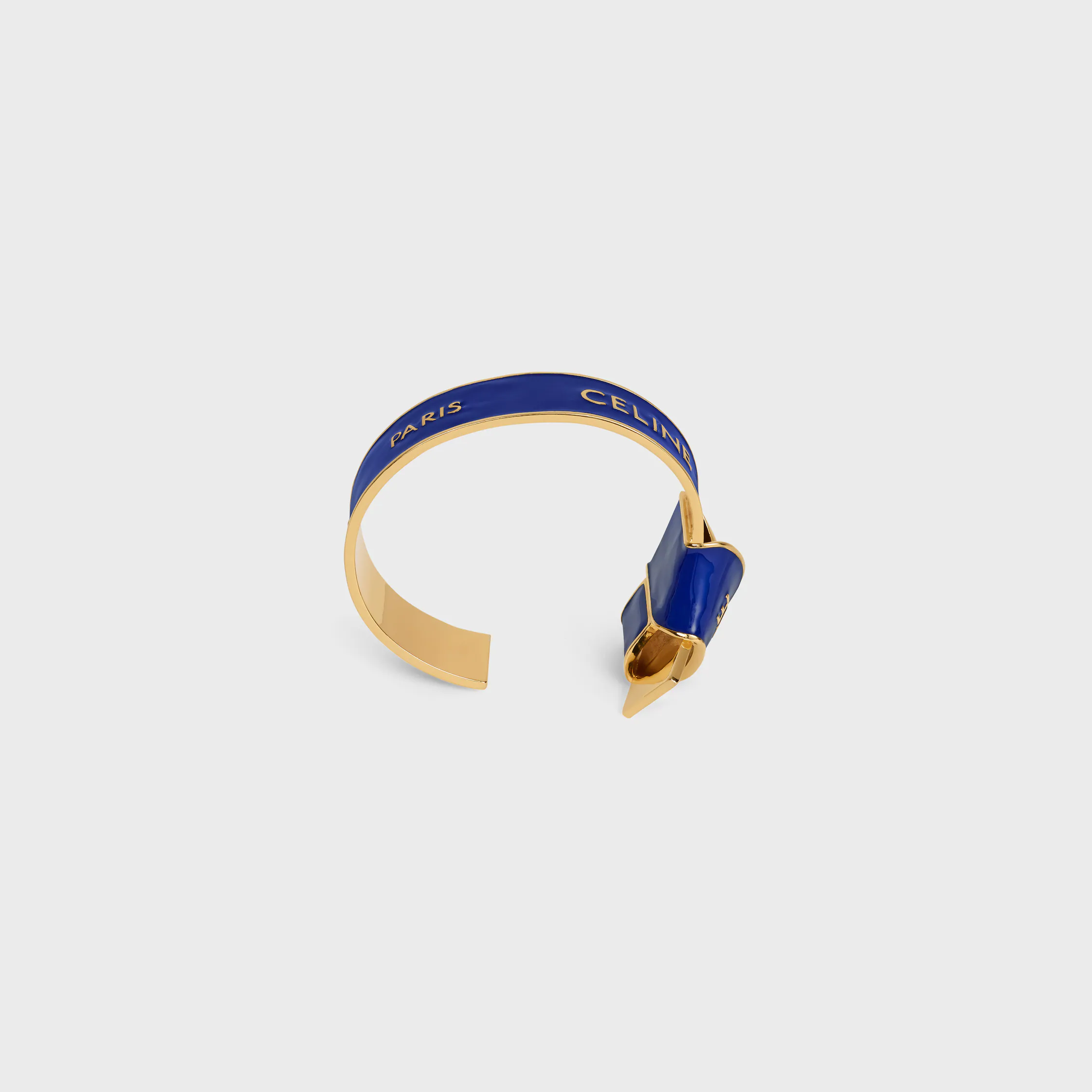 Pulsera con lazo de cinta Celine en esmalte y latón con acabado dorado