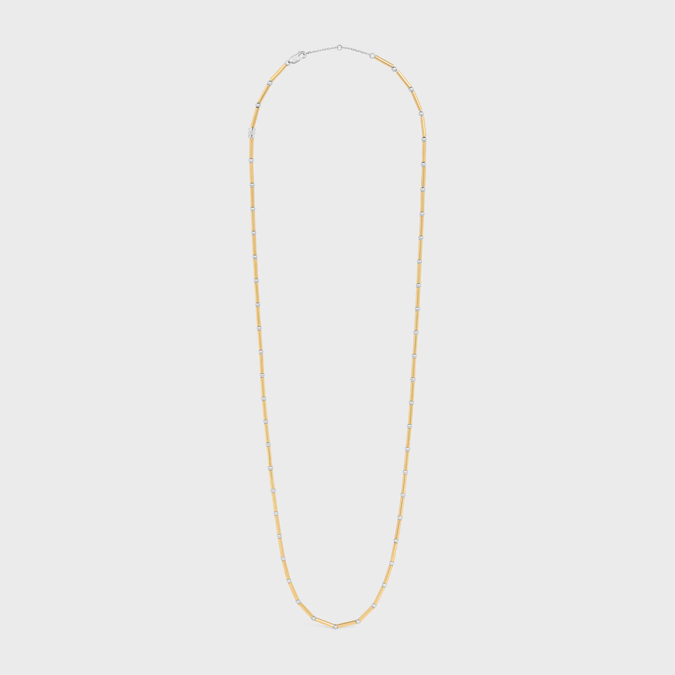 COLLAR DE CADENAS LARGAS DE LATÓN CON ACABADO EN ORO Y RODIO