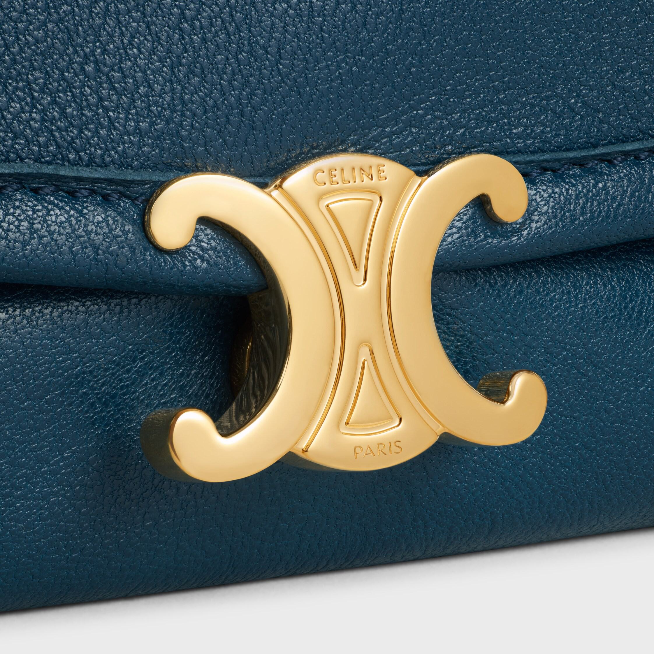 BOLSO HALFMOON SOFT TRIOMPHE EN CUERO DE CORDERO SUAVE Y BRILLOSO
