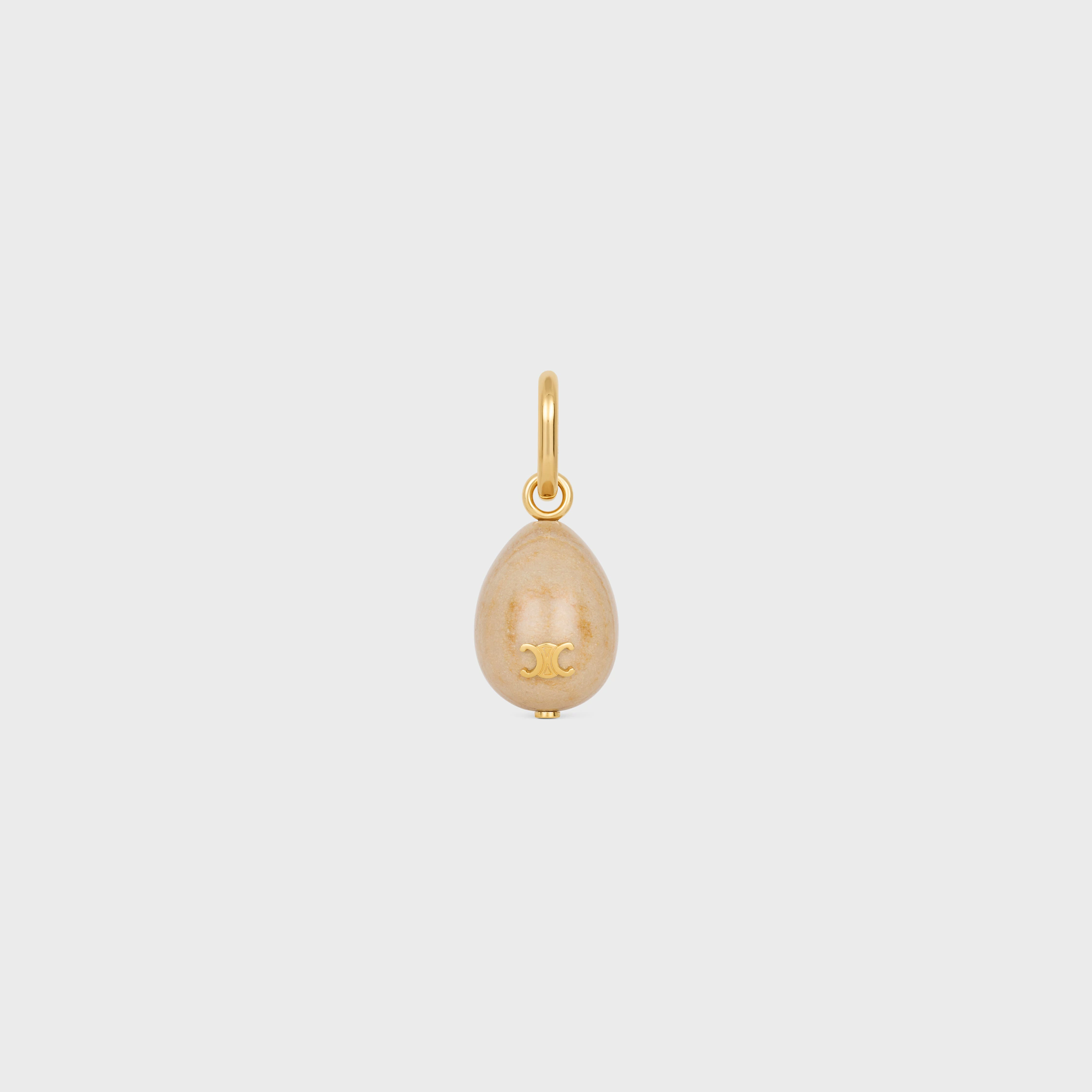CHARMS HUEVO DE PIEDRA EN BOTTICINO Y LATÓN CON ACABADO EN ORO