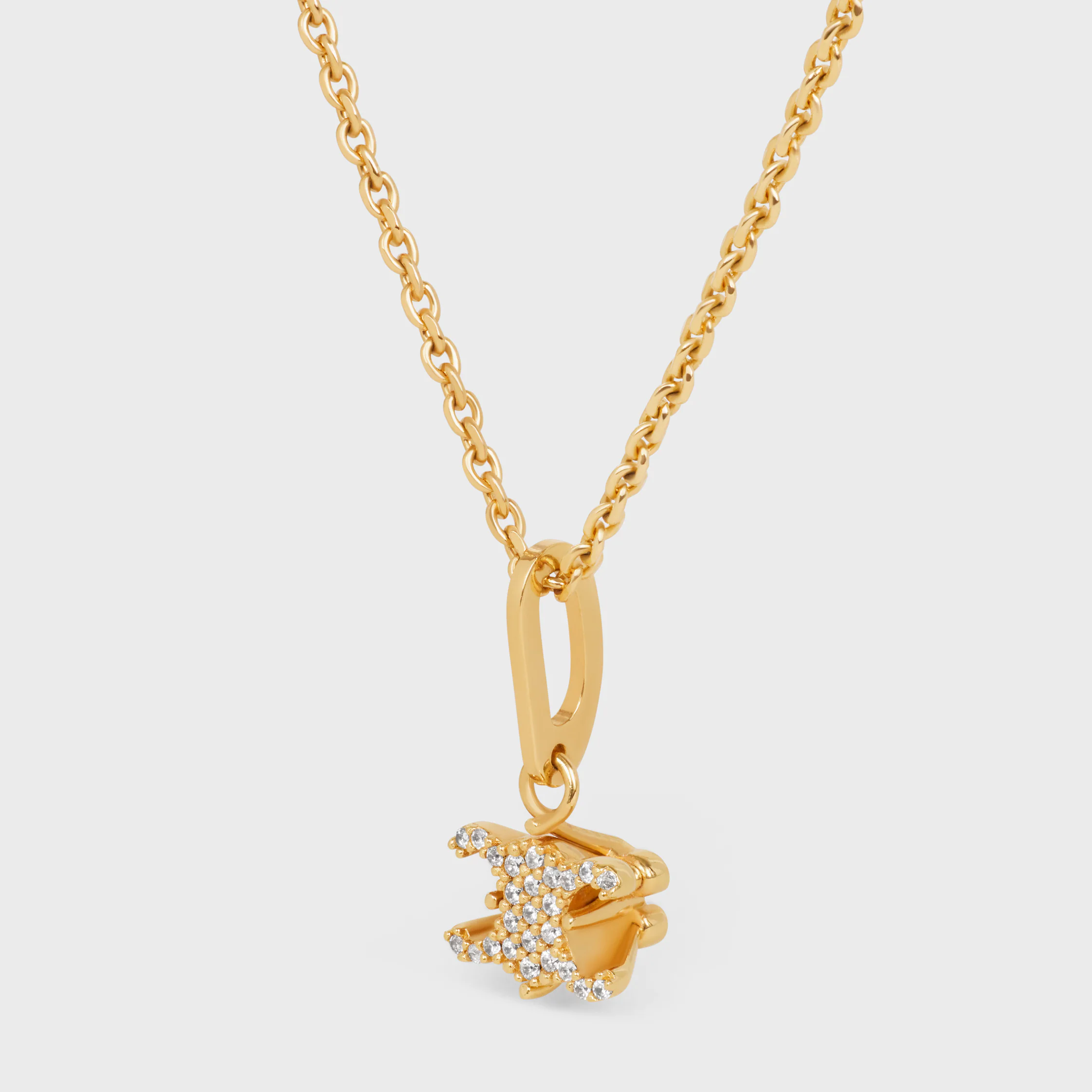 Collar Solitaire Sparkle Triomphe en strass y latón con acabado dorado