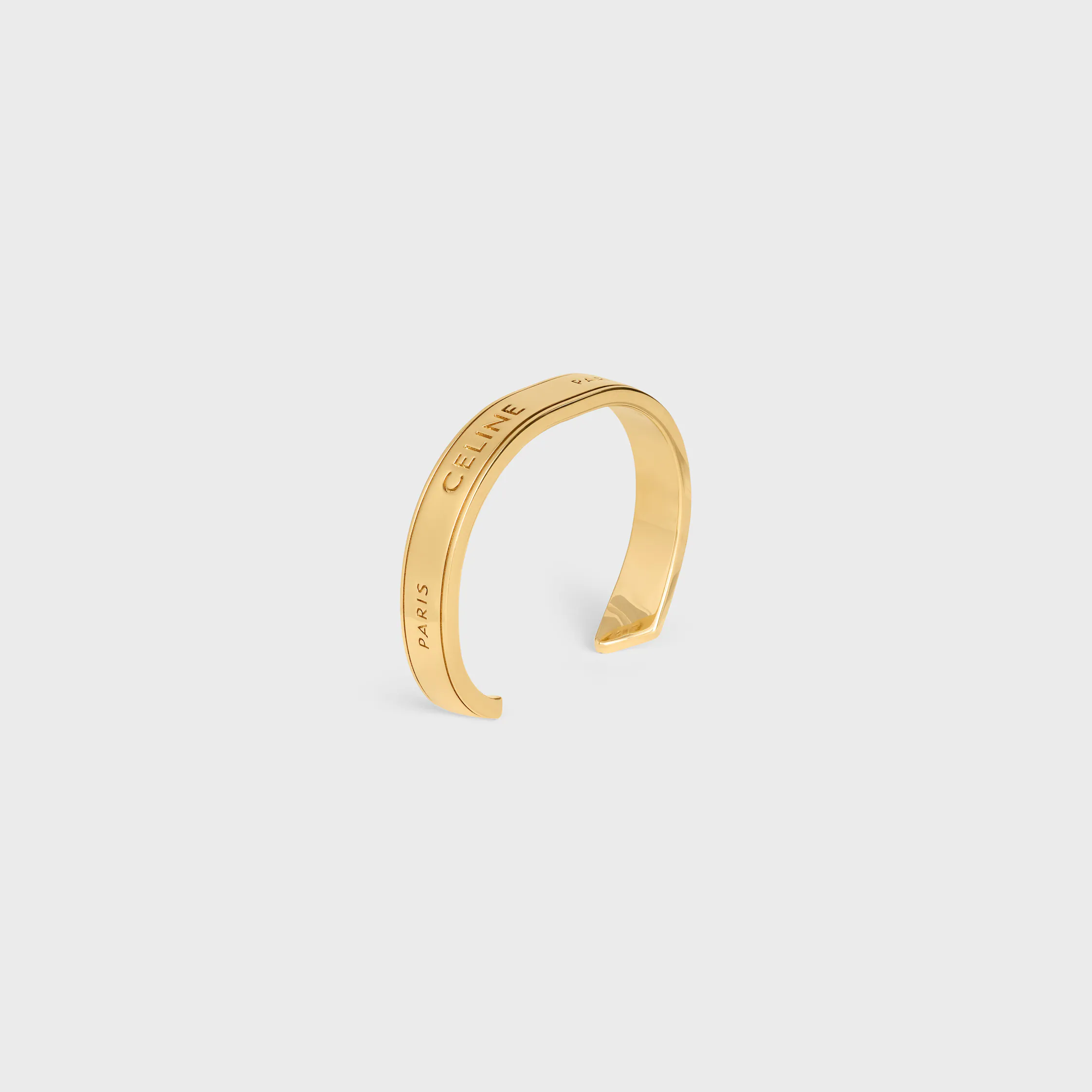 Pulsera pequeña de cinta Celine en latón con acabado dorado