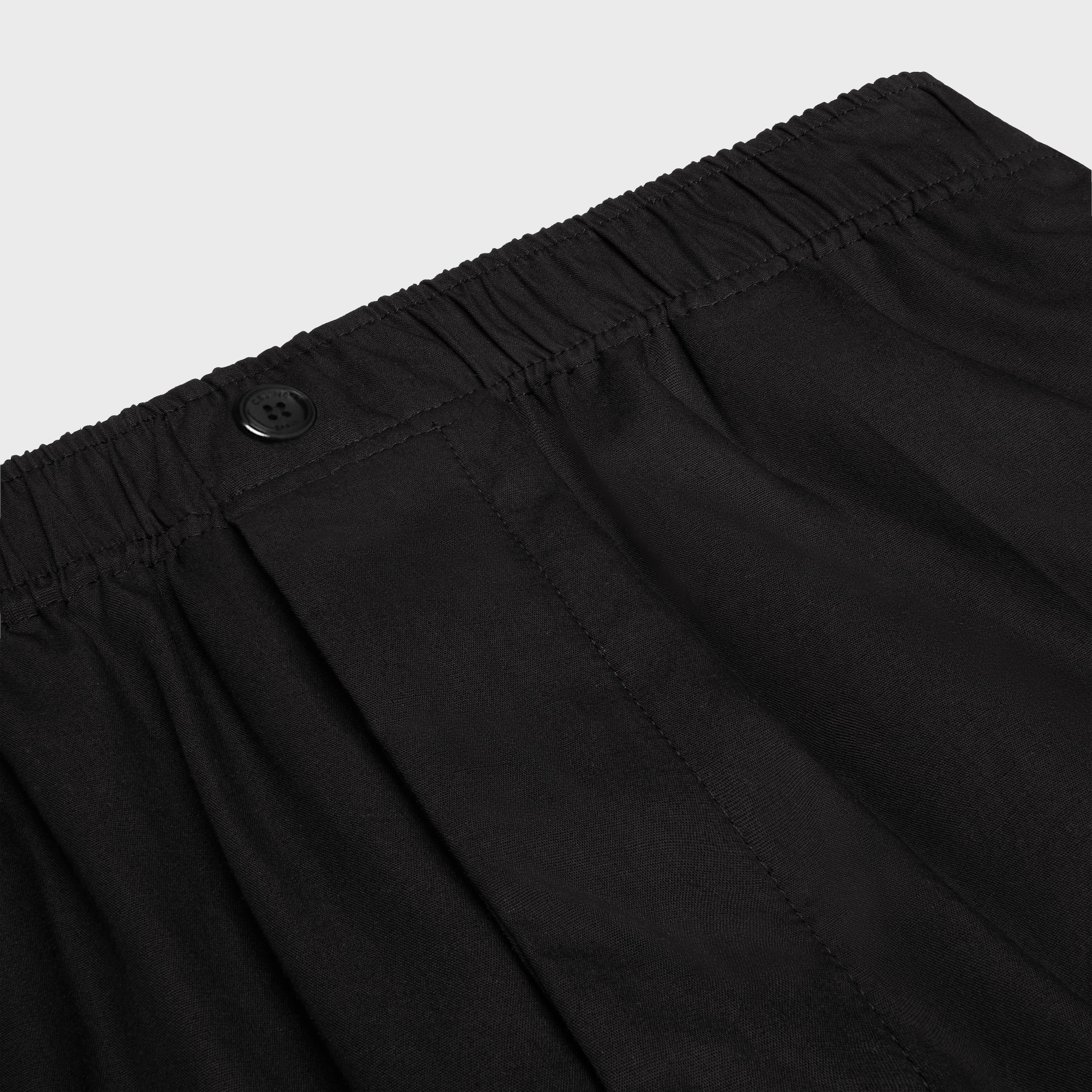 pantalones en tela de algodón y lino