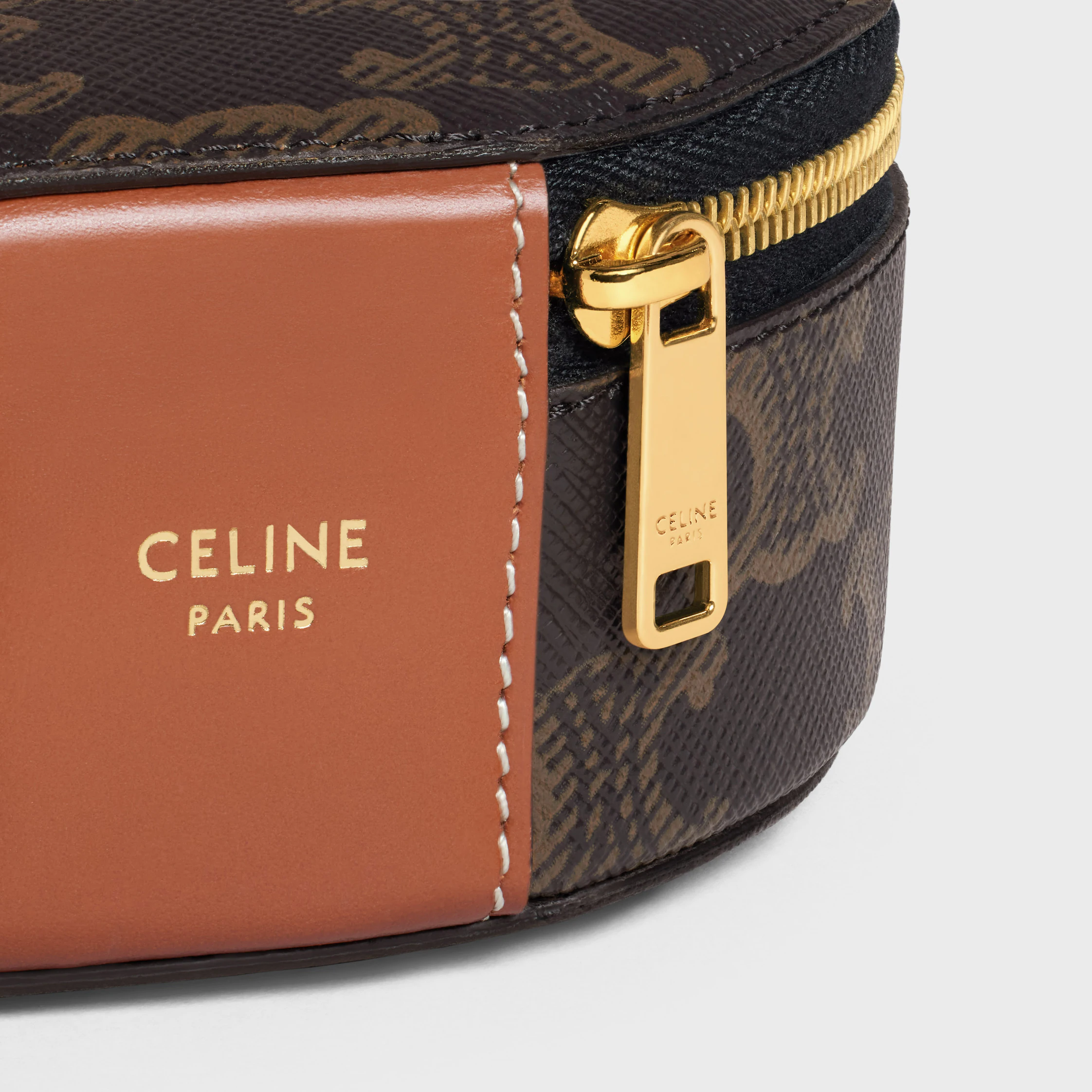 Estuche redondo con cremallera en lona Triomphe y cuero de ternera