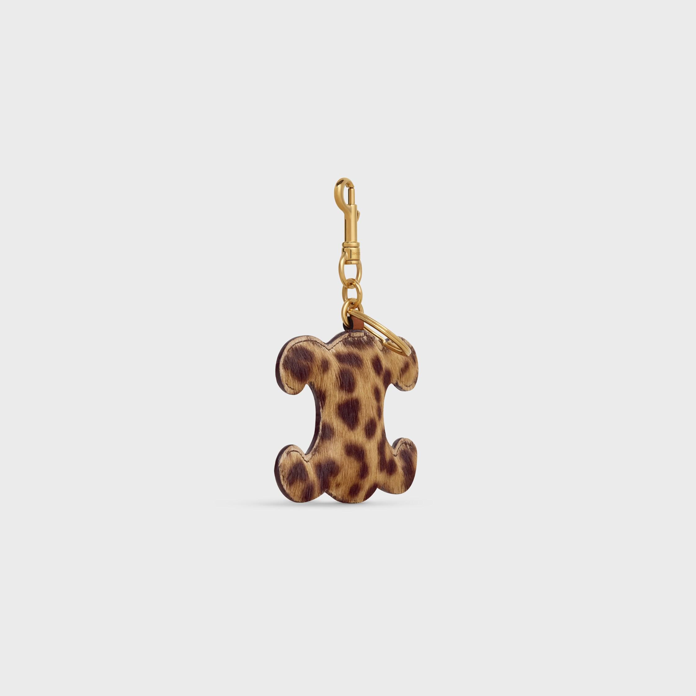 Llavero con pompón TRIOMPHE en PONY con estampado de leopardo y cuero de ternera