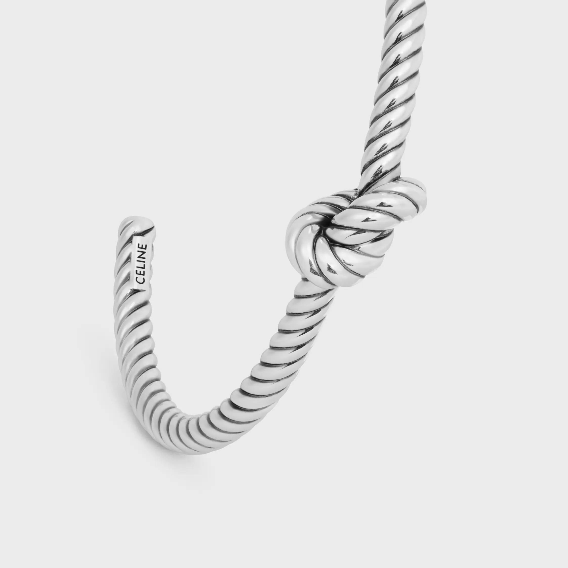 Pulsera con diseño de cordón en latón con acabado rodio