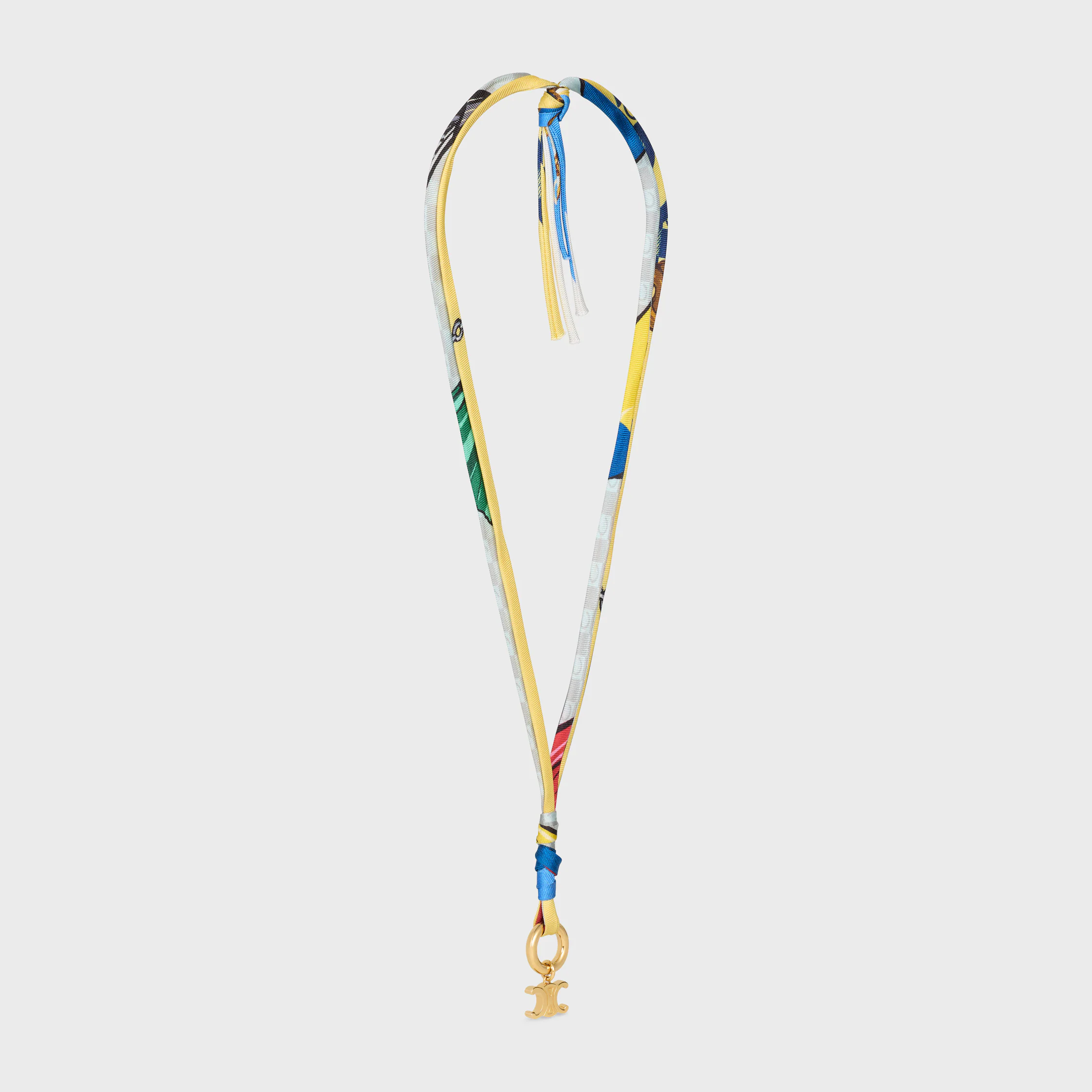 Collar de cordón con colgantes de Celine en seda y latón con acabado dorado