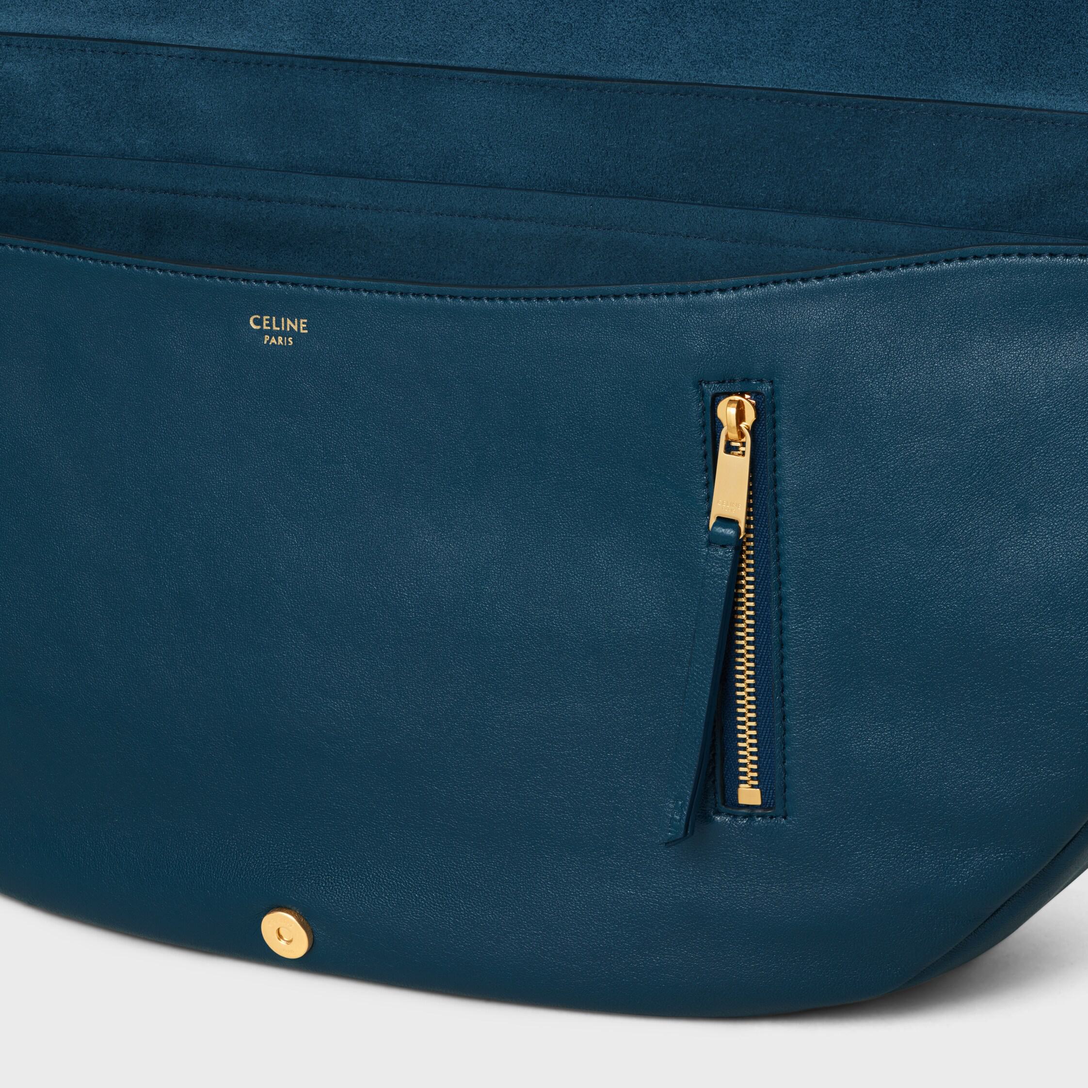 BOLSO HALFMOON SOFT TRIOMPHE EN CUERO DE CORDERO SUAVE Y BRILLOSO