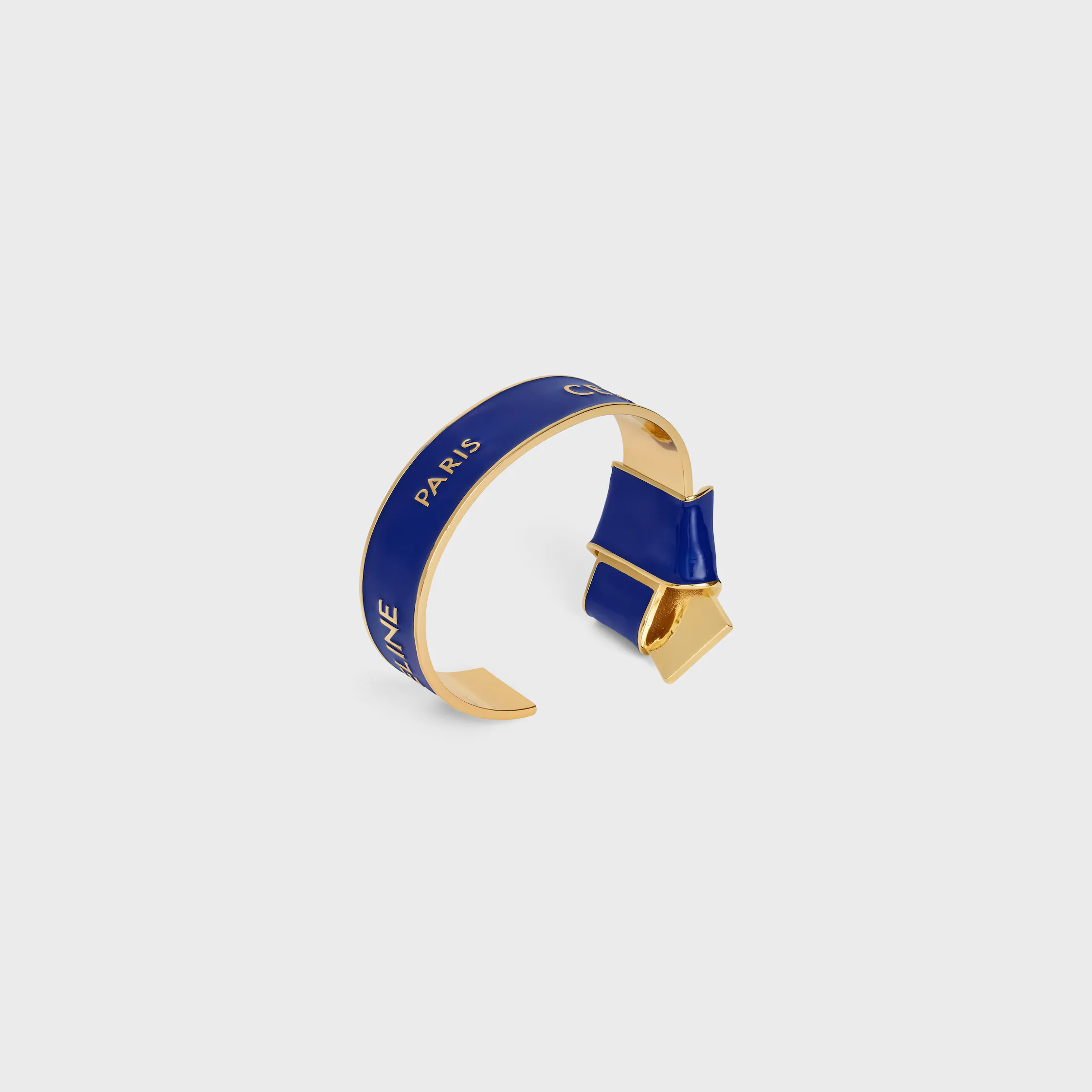 Pulsera con lazo de cinta Celine en esmalte y latón con acabado dorado