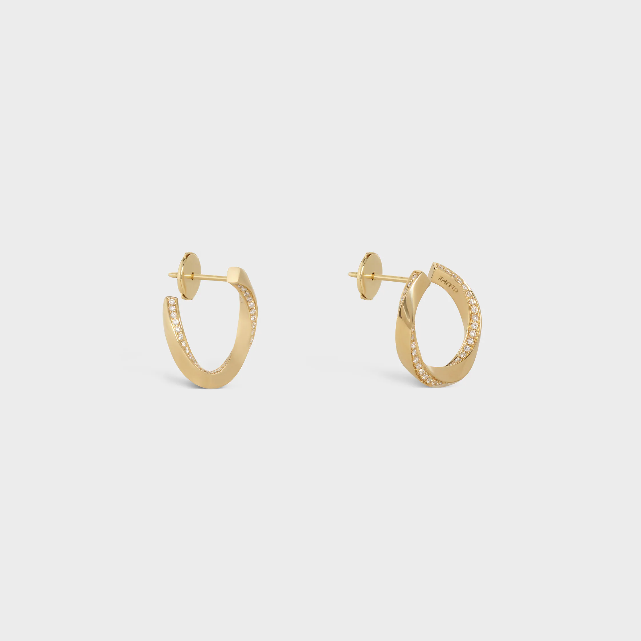 Aretes de torsión en oro amarillo y diamantes