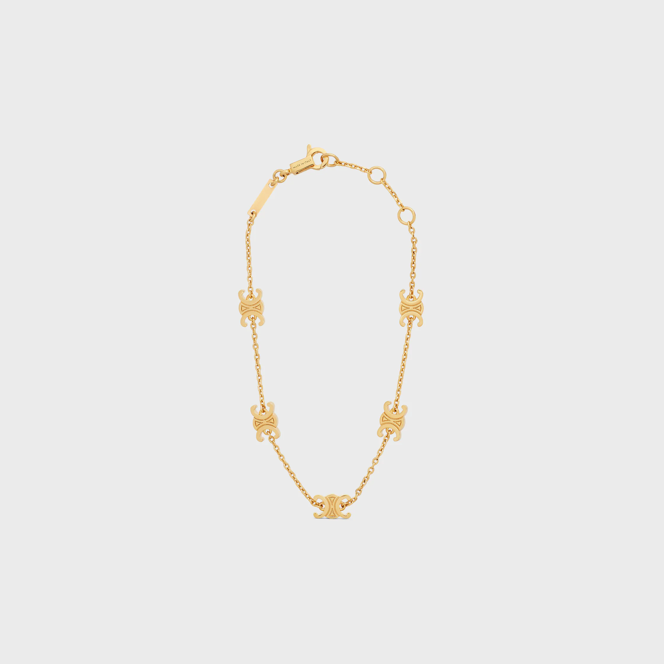 Pulsera Triomphe Mini Triomphe en latón con acabado dorado